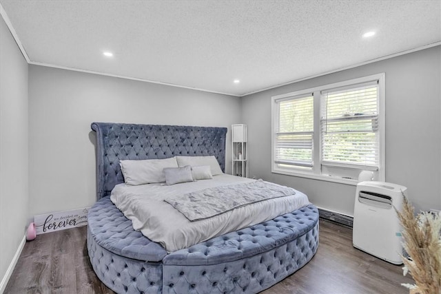 202 Hartford Pike, Foster, RI 02825 - bedroom with dark wood finished floors, recessed lighting, ornamental molding, a textured ceiling, and baseboards