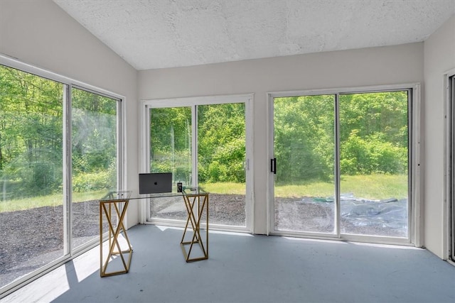 202 Hartford Pike, Foster, RI 02825 - unfurnished sunroom with concrete floors and a textured ceiling