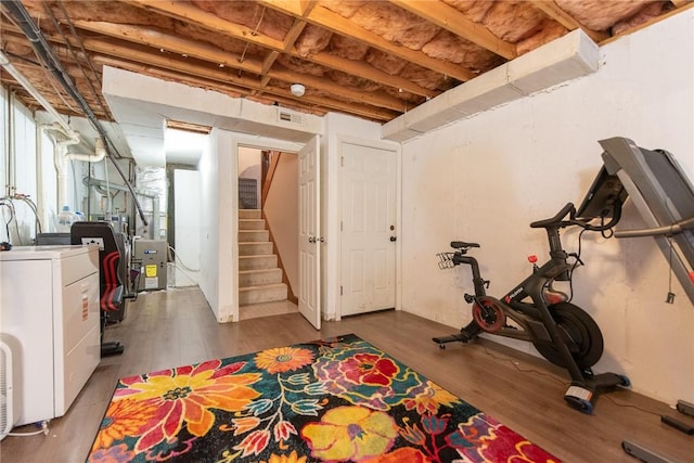 15 Loyalist Dr Unit 15B, Uxbridge, MA 01569 - below grade area with stairs and wood finished floors