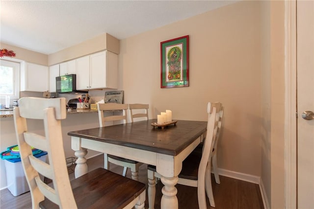 15 Loyalist Dr Unit 15B, Uxbridge, MA 01569 - dining area with wood finished floors and baseboards