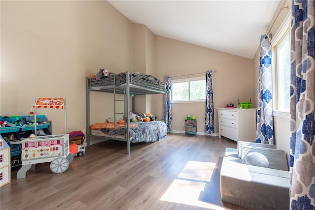 15 Loyalist Dr Unit 15B, Uxbridge, MA 01569 - bedroom featuring vaulted ceiling, wood finished floors, and baseboards
