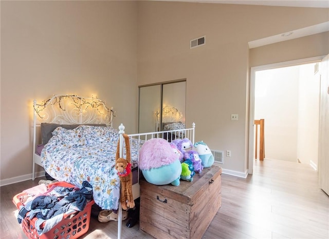 15 Loyalist Dr Unit 15B, Uxbridge, MA 01569 - bedroom featuring wood finished floors, baseboards, and high vaulted ceiling