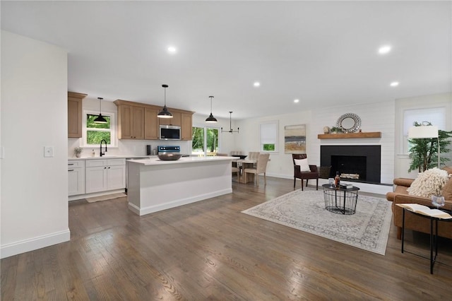 7 Nichols Rd, South Kingstown, RI 02881 - living area featuring recessed lighting, dark wood-style flooring, baseboards, and a large fireplace