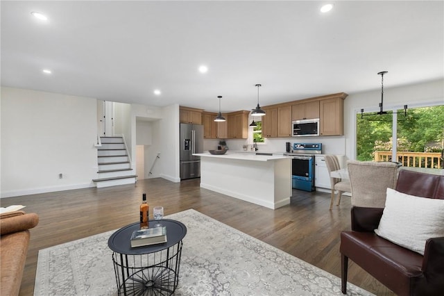 7 Nichols Rd, South Kingstown, RI 02881 - living area with dark wood-style floors, recessed lighting, stairs, and baseboards
