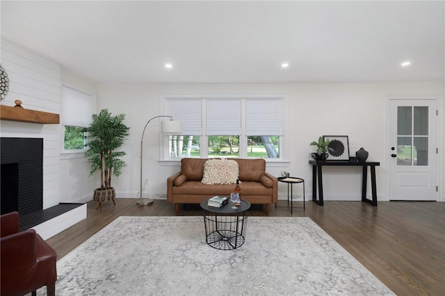 7 Nichols Rd, South Kingstown, RI 02881 - living room with wood finished floors, recessed lighting, a fireplace, and baseboards
