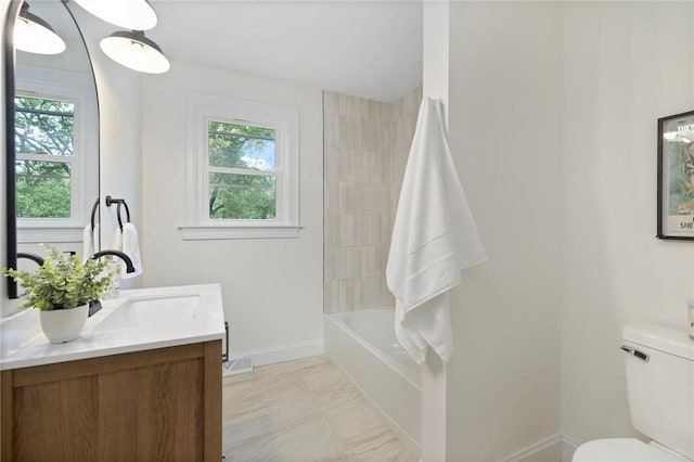 7 Nichols Rd, South Kingstown, RI 02881 - bathroom featuring vanity, toilet, plenty of natural light, and baseboards