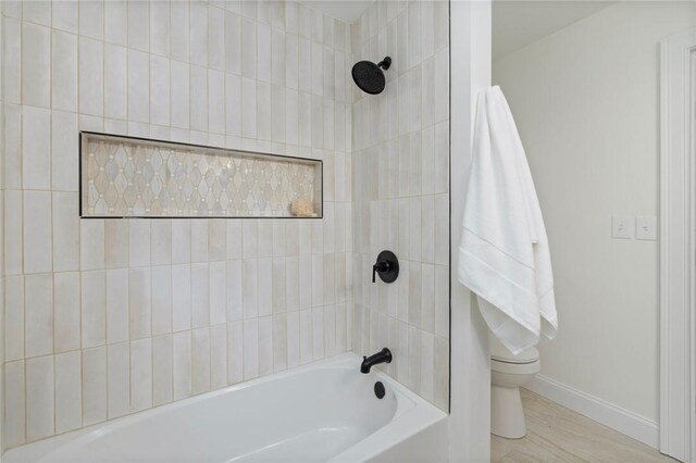 7 Nichols Rd, South Kingstown, RI 02881 - bathroom with toilet, baseboards, and bathing tub / shower combination