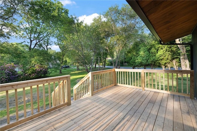 7 Nichols Rd, South Kingstown, RI 02881 - deck featuring a lawn and view of wooded area