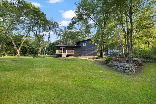 7 Nichols Rd, South Kingstown, RI 02881 - view of grassy yard with a deck