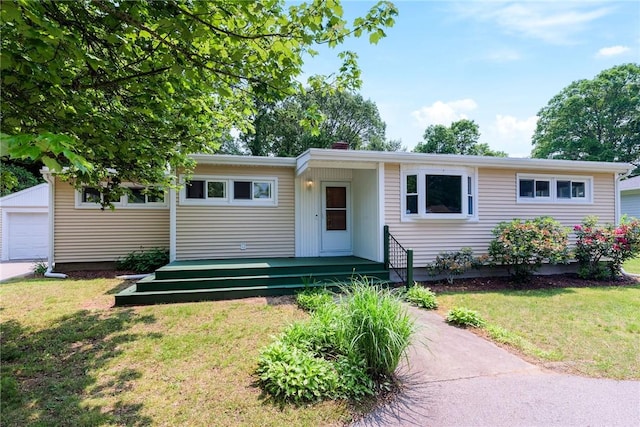 7 Stuart St, Westerly, RI 02891 - ranch-style house featuring a front lawn and a deck