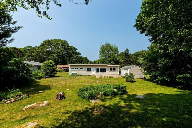 7 Stuart St, Westerly, RI 02891 - back of property with a lawn