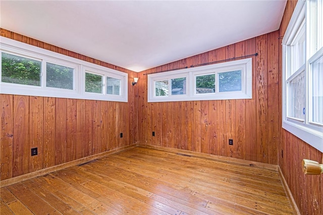 7 Stuart St, Westerly, RI 02891 - unfurnished room with hardwood / wood-style floors, wood walls, and baseboards