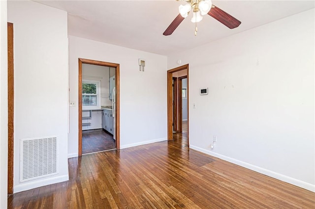7 Stuart St, Westerly, RI 02891 - empty room with wood finished floors, ceiling fan, and baseboards