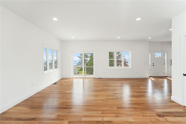 41 Burnett Rd, Warwick, RI 02889 - unfurnished living room featuring healthy amount of natural light, recessed lighting, and baseboards