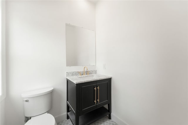 41 Burnett Rd, Warwick, RI 02889 - half bath featuring toilet, vanity, and baseboards