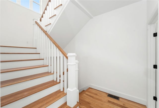 41 Burnett Rd, Warwick, RI 02889 - stairs featuring wood finished floors and baseboards