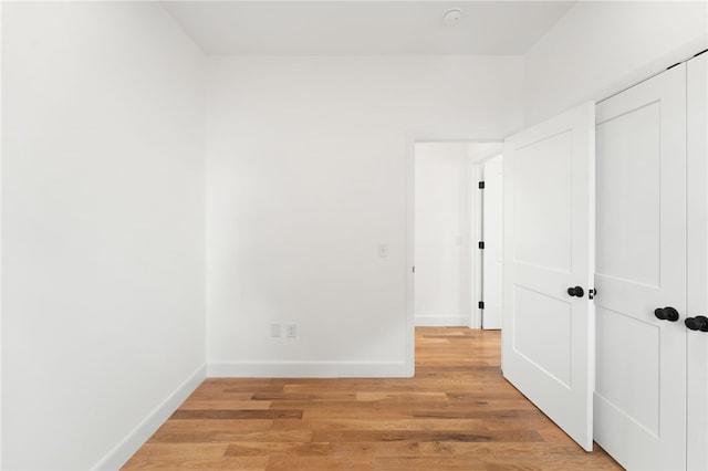 41 Burnett Rd, Warwick, RI 02889 - unfurnished bedroom featuring baseboards and light wood-style floors