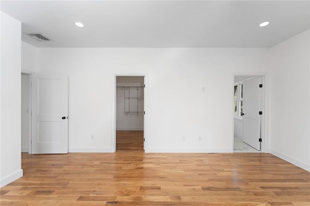 41 Burnett Rd, Warwick, RI 02889 - empty room with light wood-style flooring, baseboards, and recessed lighting