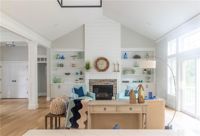 04 Carrs Ln, North Kingstown, RI 02852 - living area featuring a fireplace, light wood-style floors, built in features, baseboards, and ornate columns