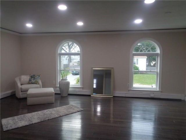176 Vernon St, Warwick, RI 02889 - living area featuring wood finished floors, recessed lighting, baseboard heating, and baseboards