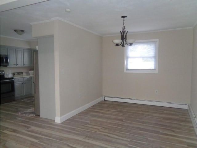 176 Vernon St, Warwick, RI 02889 - unfurnished dining area with wood finished floors, a chandelier, crown molding, a baseboard radiator, and baseboards