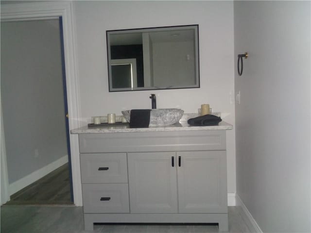 176 Vernon St, Warwick, RI 02889 - bathroom with vanity and baseboards