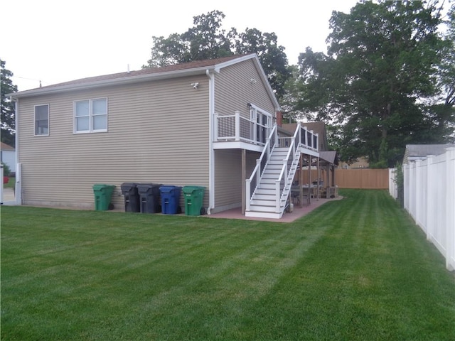 176 Vernon St, Warwick, RI 02889 - rear view of property with stairs, a deck, and a patio area