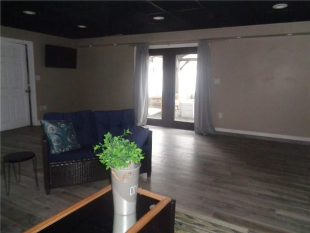176 Vernon St, Warwick, RI 02889 - living area with wood finished floors and baseboards