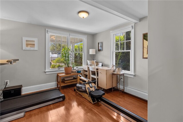 37 Brownell St, Warren, RI 02885 - workout room featuring wood finished floors, a baseboard radiator, and baseboards