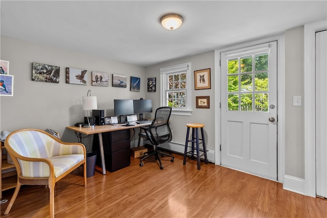 37 Brownell St, Warren, RI 02885 - office area featuring wood finished floors, a baseboard radiator, and baseboards