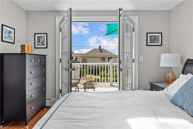 37 Brownell St, Warren, RI 02885 - bedroom featuring access to exterior and wood finished floors