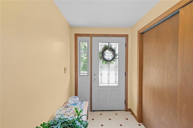 1221 Phenix Ave, Cranston, RI 02921 - entrance foyer with light tile patterned flooring and baseboards
