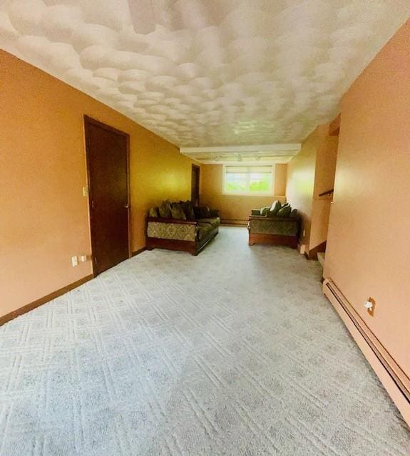 1221 Phenix Ave, Cranston, RI 02921 - bedroom with a baseboard radiator and light carpet