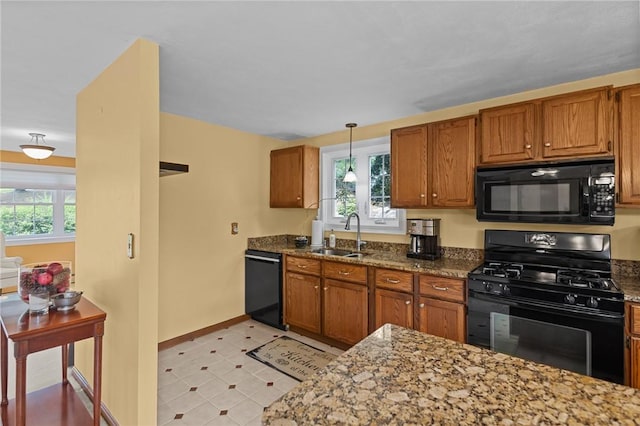 1221 Phenix Ave, Cranston, RI 02921 - kitchen featuring black appliances, a sink, and brown cabinets