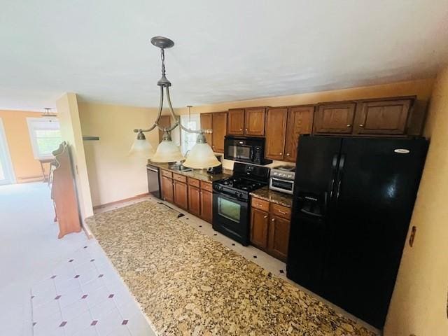 1221 Phenix Ave, Cranston, RI 02921 - kitchen featuring black appliances, hanging light fixtures, and a sink