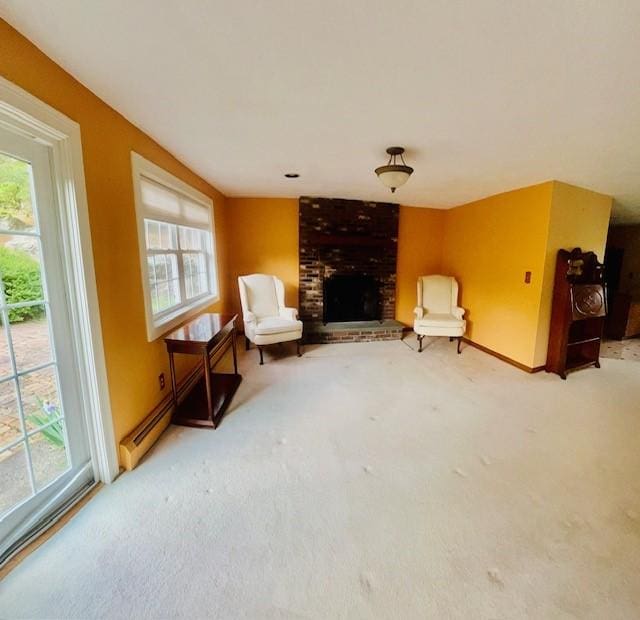 1221 Phenix Ave, Cranston, RI 02921 - living area featuring carpet flooring, a brick fireplace, and baseboards