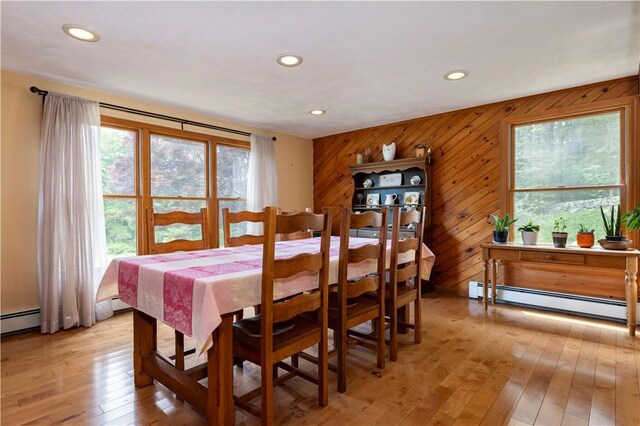 71 Phillips Ln, Glocester, RI 02814 - dining area with baseboard heating, recessed lighting, light wood finished floors, and wooden walls