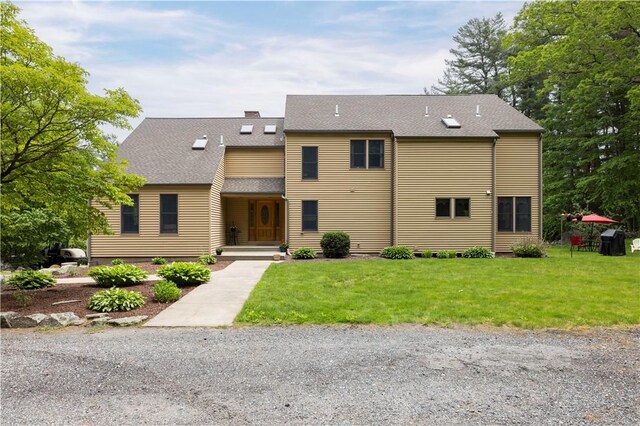 71 Phillips Ln, Glocester, RI 02814 - view of front of property with a front lawn, a chimney, and a shingled roof
