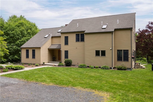 71 Phillips Ln, Glocester, RI 02814 - view of front facade with a front lawn and a shingled roof