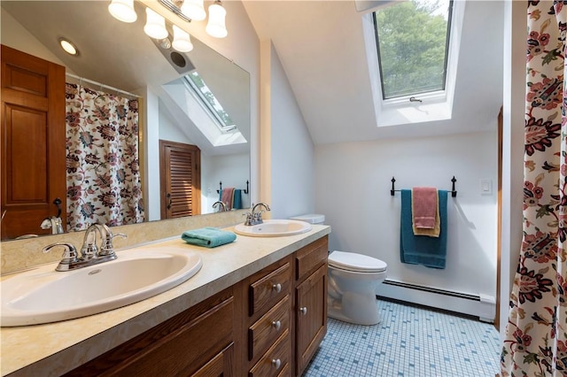 71 Phillips Ln, Glocester, RI 02814 - full bath featuring a skylight, baseboard heating, lofted ceiling, double vanity, and toilet