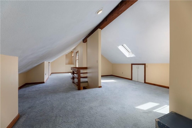 71 Phillips Ln, Glocester, RI 02814 - bonus room featuring a skylight, vaulted ceiling, carpet floors, and baseboards