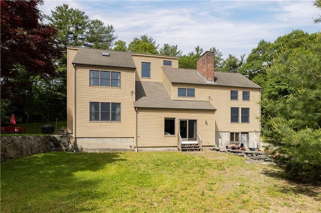 71 Phillips Ln, Glocester, RI 02814 - back of property featuring a chimney, a lawn, entry steps, and a shingled roof