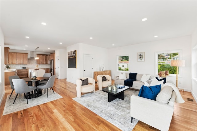 51 Burnett Rd, Warwick, RI 02889 - living area featuring recessed lighting, light wood finished floors, and baseboards