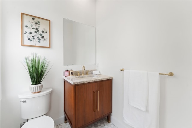51 Burnett Rd, Warwick, RI 02889 - bathroom featuring toilet, vanity, and baseboards