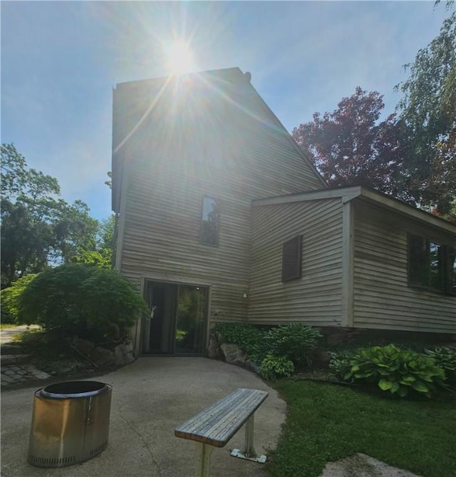 66 Shadbush Rd, South Kingstown, RI 02879 - rear view of property with a patio area