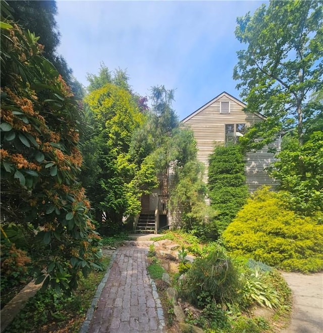 66 Shadbush Rd, South Kingstown, RI 02879 - view of home's exterior featuring stairway