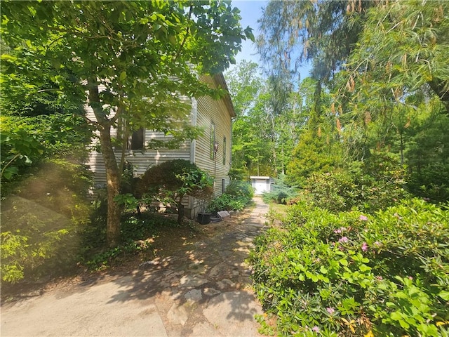 66 Shadbush Rd, South Kingstown, RI 02879 - view of yard with asphalt driveway