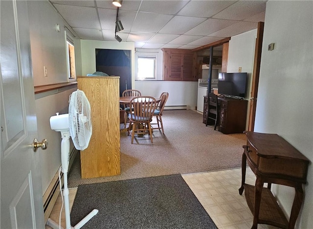 66 Shadbush Rd, South Kingstown, RI 02879 - carpeted dining room with a paneled ceiling and a baseboard radiator