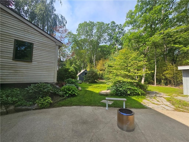 66 Shadbush Rd, South Kingstown, RI 02879 - view of green lawn with a patio area