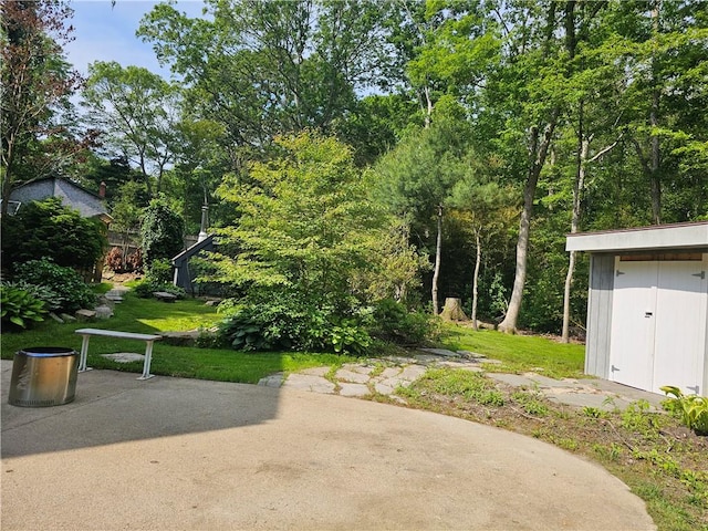 66 Shadbush Rd, South Kingstown, RI 02879 - view of yard featuring a patio area